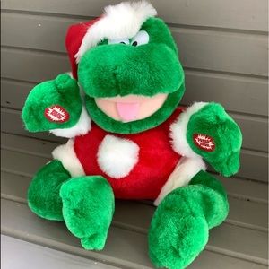 A Singing Christmas Frog, Plush Toy, 12 Inches Tall & 12 Wide
